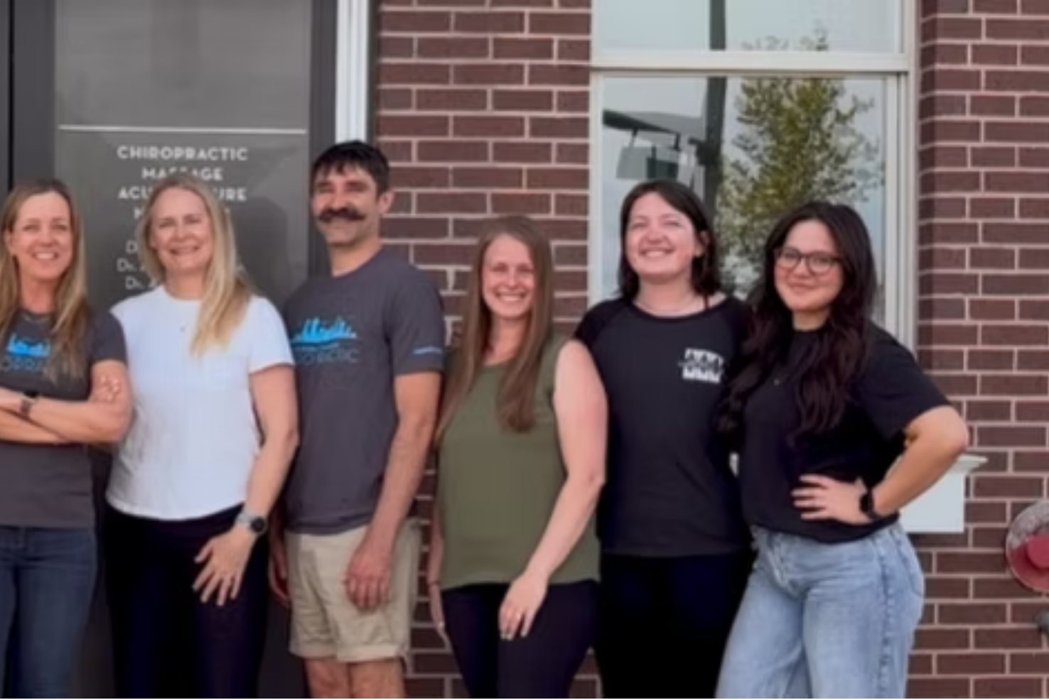 Members of the Washington Park Chiropractic team outside the clinic